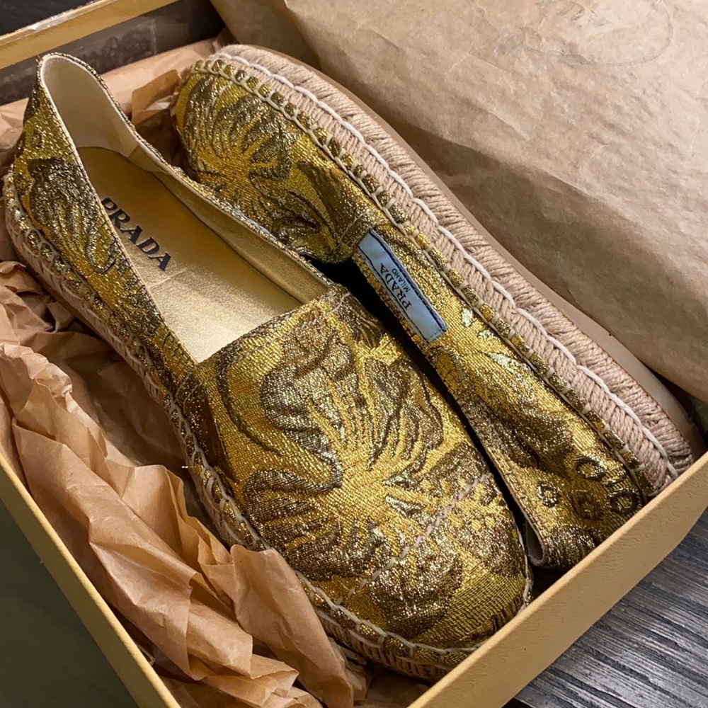 Prada espadrilles in gold and yellow color.